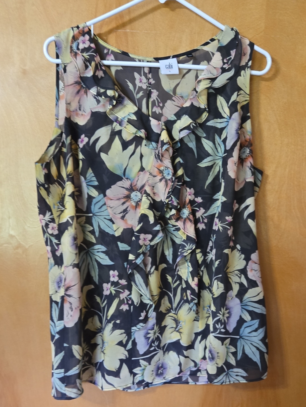 CAbi Black Floral Ruffle Front Sleeveless Top